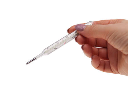mercury thermometer in hand, high temperature conceptの写真素材