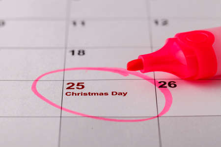 Circled 25 on calendar; focus on date 25の写真素材