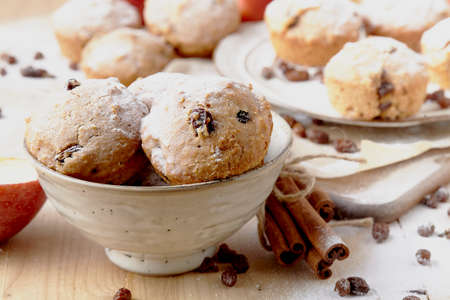 Closeup of a plate of cranberry and nut cookies on a Christmas plateの写真素材