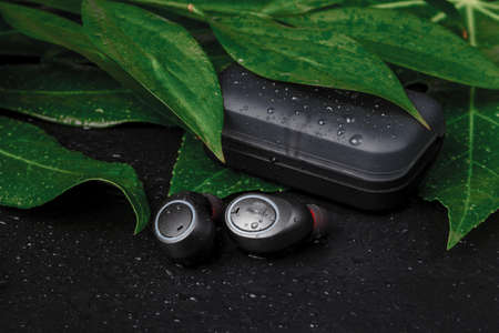 Bluetooth earphones for listen music in any weather on streetの写真素材