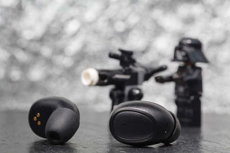 Bluetooth earphones for listen music in any weather on streetの写真素材