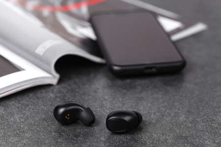 Close up wireless earphones, waterproof for fitnesの写真素材