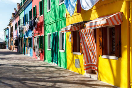 Colorful houses alongside the canal in Burano islandの写真素材