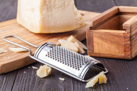 Traditional italian food - aged in caves Italian parmesan hard cheese from Parmigiano-Reggiano, Italyの写真素材