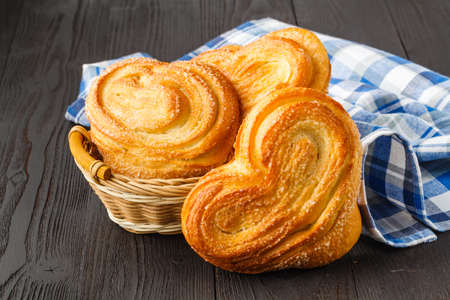 Freshly baked cinnamon rolls dusted with powdered sugarの写真素材