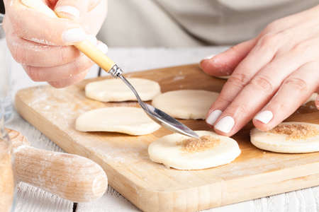 Kitchen with raw Christmas cookies. Baking biscuits.の写真素材
