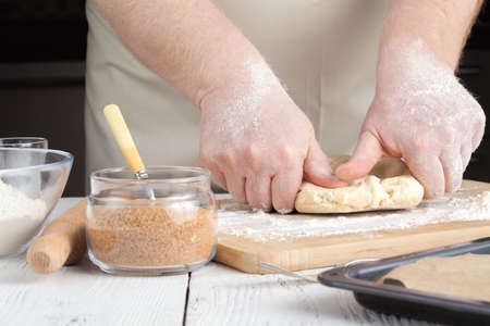 Kitchen with raw Christmas cookies. Baking biscuits.の写真素材
