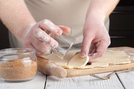 Kitchen with raw Christmas cookies. Baking biscuits.の写真素材