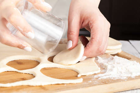 Kitchen with raw Christmas cookies. Baking biscuits.の写真素材