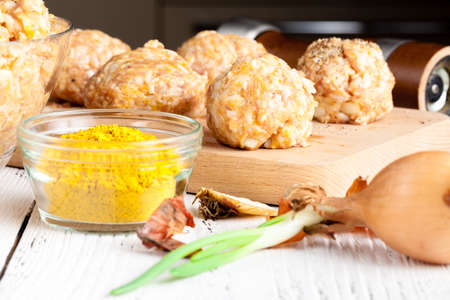 Cooking diet chicken meatballs for healthy dinnerの写真素材