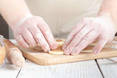 Kitchen with raw Christmas cookies. Baking biscuits.の写真素材