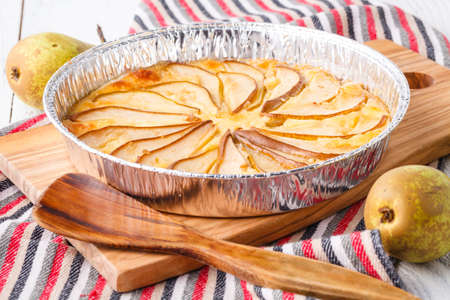 flavorous rustic open pie pear cheese cinnamon and almondの写真素材