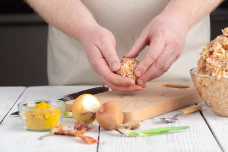 Cooking diet chicken meatballs for healthy dinnerの写真素材