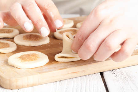 Making festive gingerbread dough on a baking sheetの写真素材