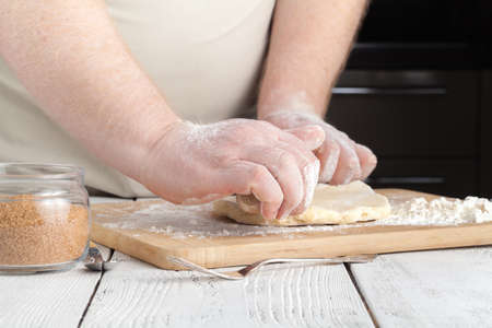 Kitchen with raw Christmas cookies. Baking biscuits.の写真素材