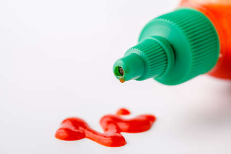 Chili sauce with tomato sauce from bottleの写真素材