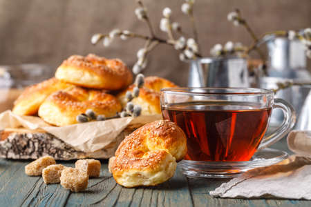 cookies with cup on wooden backgroundの写真素材