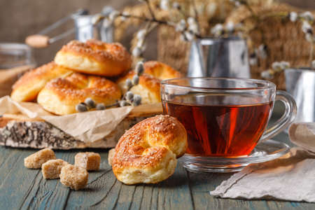 Tea and cookies on wooden tableの写真素材