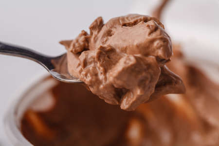 scooping chocolate ice cream close up shot, shallow focusの写真素材