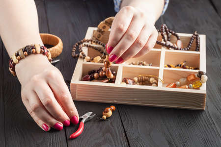 woman process hand made design freelance work at home make accessories earrings, ornaments,の写真素材
