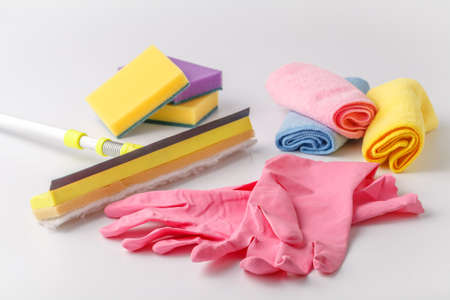 Cleaning set of different items for kitchen, bathroom and other rooms. Copy space. Cleaning service conceptの写真素材