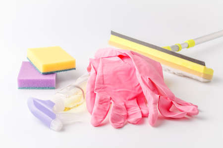 Spring cleaning background with space for copy text. Cleaning up tools. Plastic spray, sponge, gloves and desinfectant productsの写真素材