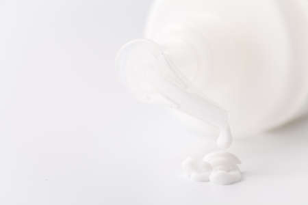 White plastic cosmetic foam pump bottleの写真素材