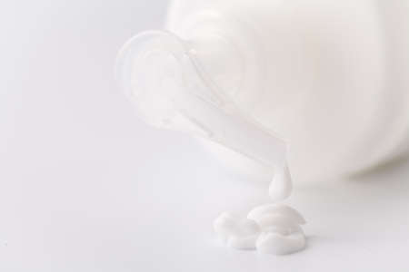 White plastic cosmetic foam pump bottleの写真素材