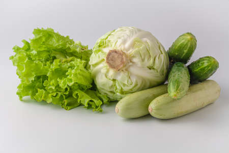Cucumbers and tomatoes for diet and healthy eating. Fresh vegetablesの写真素材