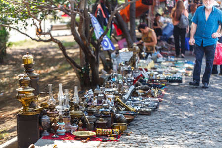 TBILISI, GEORGIA â€“ AUGUST 07, 2018: Antiques at flea market dry bridge in Tbilisi