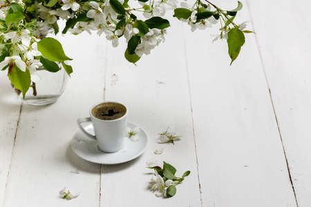 Romantic coffee in the blossoming garden, spring breakfastの写真素材