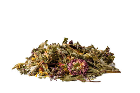 Black dry tea with fruits and petalsの写真素材