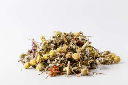 Invigorating Green Tea pineapple pieces, rosehip, slices of apple, cherry, strawberry, marigold petals and rosesの写真素材