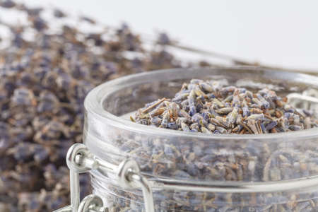 Dry lavander flowers in glass jarの写真素材