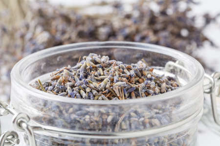 Dry lavander flowers in glass jarの写真素材