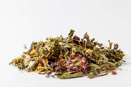 chamomile mixes with lemongrass and hibiscus herbal tea, over whiteの写真素材
