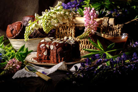 chocolate muffins on a wooden backgroundの写真素材