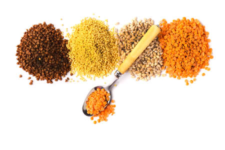 Flat lay composition with different types of grains and cereals isolated on white backgroundの写真素材