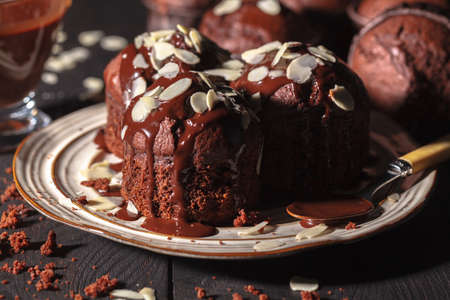 delicious chocolate muffins on dark background, selective focusの写真素材