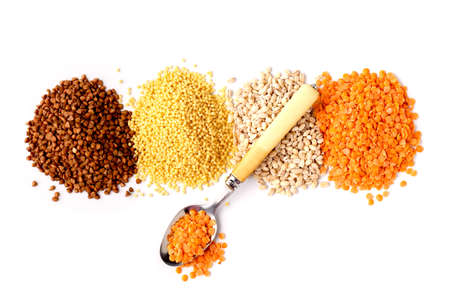 Flat lay composition with different types of grains and cereals isolated on white backgroundの写真素材