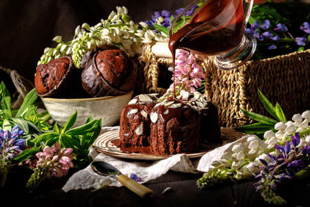 delicious chocolate muffins on dark background, selective focusの写真素材