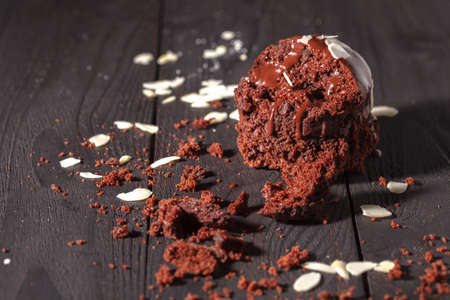 Chocolate muffins on the table, dark backgroundの写真素材