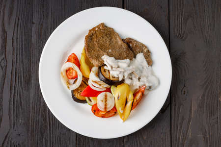 Barbecue dish. Beef steak and grilled vegetablesの写真素材