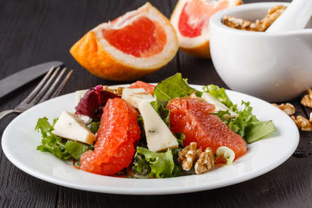 salad with grapefruit, arugula and cheeseの写真素材