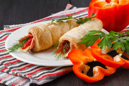 Sushi-Style Wraps with chicken pepperoni, vegetables and nuts. Healthy snacksの写真素材