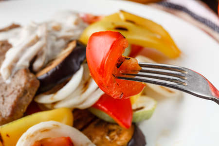 Grilled beef steak and baked vegetablesの写真素材