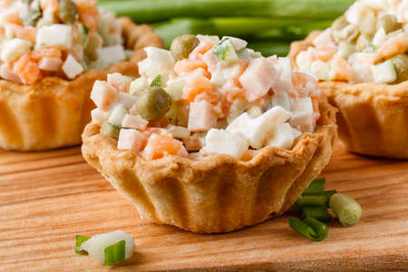 snack with ham, cheese, pepper and tomato in tartlets. Square. Concept of food, restaurant, catering, menuの写真素材