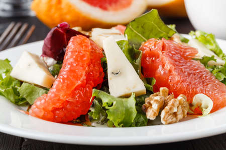 salad with grapefruit, arugula and cheeseの写真素材