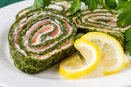 Roll salted salmon, cream cheese and spinachの写真素材