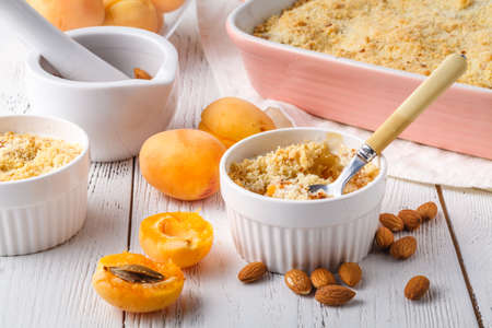 Freshly baked crumble pie on tableの写真素材